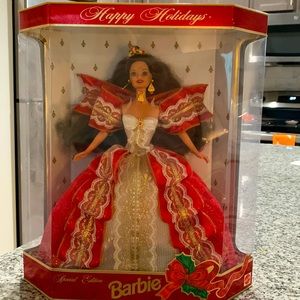 Two Holiday Barbies New in box but box